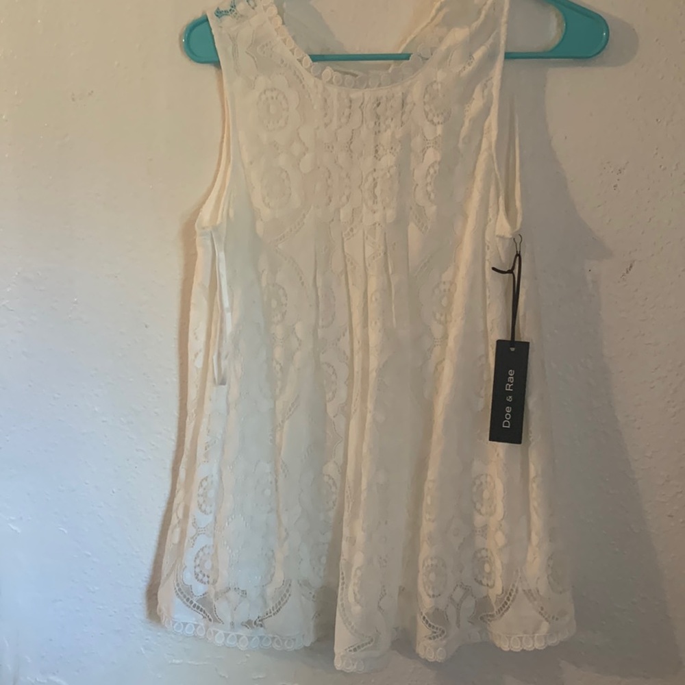 Medium white tank top. New with tags.